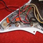 Non-original pots, caps and wiring from the '77 Strat